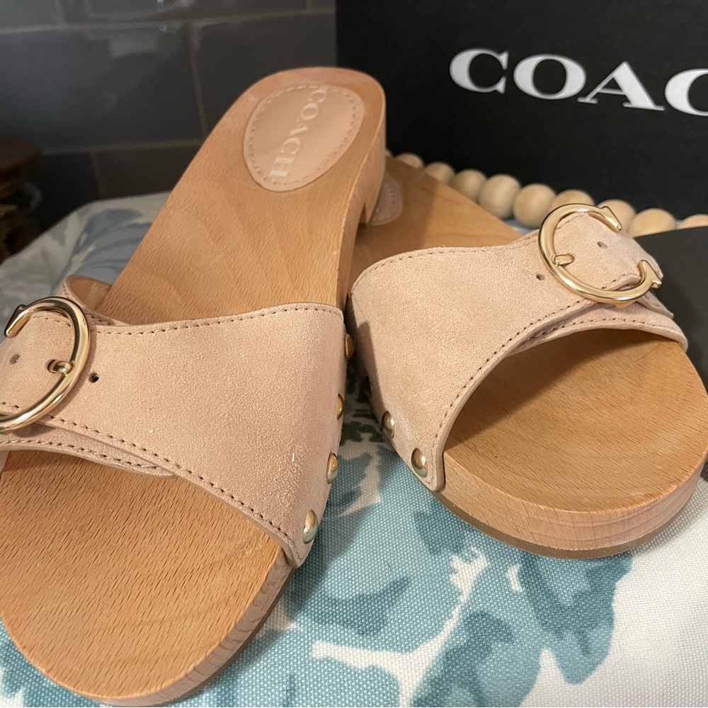 Like new cream colored Coach sandals. Size 6.